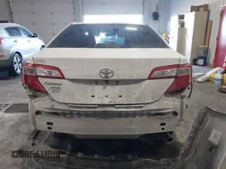 2014 Toyota Camry L with VIN 4T1BF1FK4EU763009, listed as a IAAI auction lot 41615134 with 165,293 mi miles and . Bid and sale history available at carsss.com. Image 16.