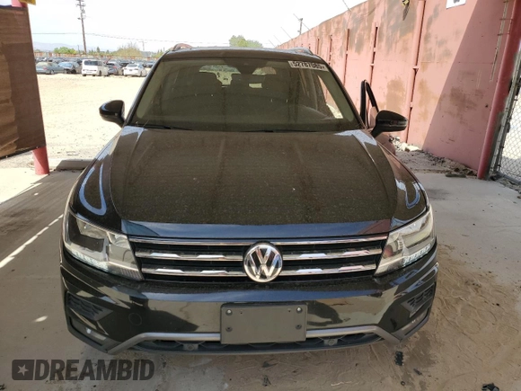2020 Volkswagen Tiguan SE z VIN 3VV3B7AXXLM138188, wystawiony jako Copart lot #52787085 z przebiegiem 58 363 mil mil oraz Szkody całkowita. Historia ofert i sprzedaży dostępna na DreamBid. Obrazek 5.