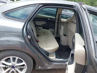 2016 Ford Focus SE z VIN 1FADP3F2XGL397092, wystawiony jako IAAI lot #42619802 z przebiegiem 232 252 mil mil oraz . Historia ofert i sprzedaży dostępna na DreamBid. Obrazek 8.