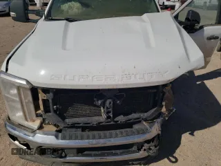 2023 Ford F-250 XL with VIN 1FT7W2BT8PEC30883, listed as a Copart auction lot 50710665 with 47,949 mi miles and Salvage Title. Bid and sale history available at DreamBid. Image 11.