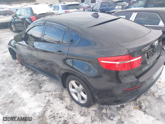 2011 BMW X6 M with VIN 5YMGZ0C57BLK14388, listed as a IAAI auction lot 41411854 with 129,248 mi miles. Bid and sale history available at carsss.com. Image 3.