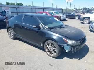 2012 Scion tC z VIN JTKJF5C70C3043757, wystawiony jako IAAI lot #42187238 z przebiegiem 166 026 mil mil oraz . Historia ofert i sprzedaży dostępna na DreamBid. Obrazek 1.
