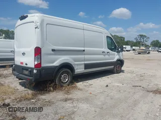 2019 Ford Transit with VIN 1FTBW2CM8KKB73080, listed as a IAAI auction lot 42090729 with 126,129 mi miles and . Bid and sale history available at carsss.com. Image 4.
