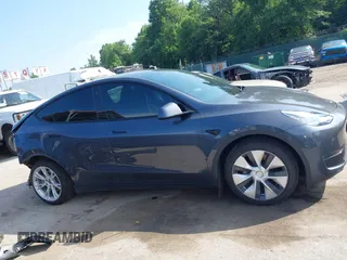 2021 Tesla Model Y Long Range z VIN 5YJYGAEE7MF146315, wystawiony jako IAAI lot #42445336 z przebiegiem 57 110 mil mil oraz . Historia ofert i sprzedaży dostępna na DreamBid. Obrazek 13.