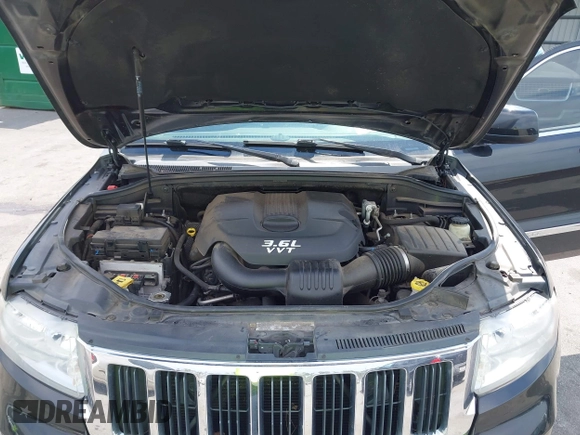 2012 Jeep Grand Cherokee Laredo with VIN 1C4RJEAG2CC259279, listed as a IAAI auction lot 41768024 with 185,161 mi miles. Bid and sale history available at carsss.com. Image 10.