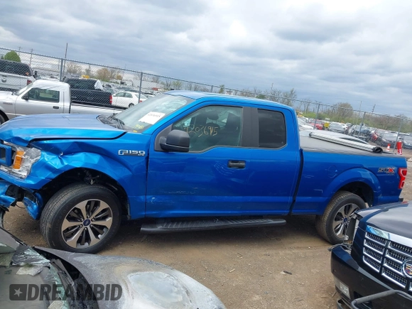 2019 Ford F-150 XL with VIN 1FTEX1EP3KFA11345, listed as a IAAI auction lot 42036915 with 136,608 mi miles. Bid and sale history available at carsss.com. Image 14.