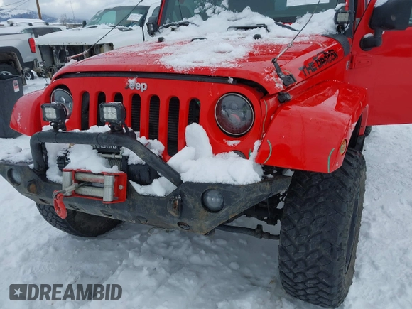 2015 Jeep Wrangler Unlimited Rubicon with VIN 1C4BJWFG7FL646463, listed as a IAAI auction lot 41537553 with 97,412 mi miles. Bid and sale history available at carsss.com. Image 6.