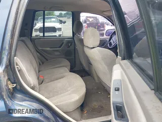 2000 Jeep Grand Cherokee Laredo z VIN 1J4GW48S9YC338947, wystawiony jako IAAI lot #42545830 z przebiegiem 234 251 mil mil oraz . Historia ofert i sprzedaży dostępna na DreamBid. Obrazek 8.
