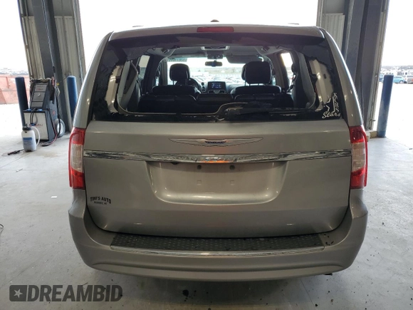 2016 Chrysler Town & Country Touring with VIN 2C4RC1BG7GR141596, listed as a Copart auction lot 53811085 with 126,280 mi miles and Clean Title. Bid and sale history available at DreamBid. Image 6.