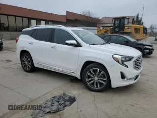 2019 GMC Terrain Denali with VIN 3GKALXEX1KL137663, listed as a Copart auction lot 52189135 with 98,477 mi miles and Salvage title. Bid and sale history available at DreamBid. Image 4.