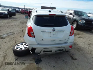 2016 Buick Encore Premium with VIN KL4CJDSB3GB607132, listed as a IAAI auction lot 41526249 with 50,617 mi miles and . Bid and sale history available at carsss.com. Image 16.