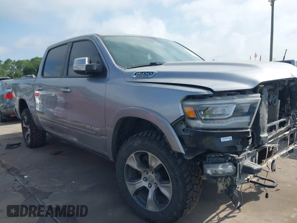 2019 Ram 1500 Laramie with VIN 1C6SRFJT8KN686506, listed as a IAAI auction lot 42499382 with 145,287 mi miles and . Bid and sale history available at DreamBid. Image 1.