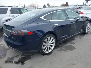 2014 Tesla Model S 60 with VIN 5YJSA1H10EFP30234, listed as a IAAI auction lot 42182249 with 186,654 mi miles and . Bid and sale history available at DreamBid. Image 4.