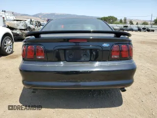 1997 Ford Mustang with VIN 1FALP4048VF172130, listed as a Copart auction lot 59790275 with 125,336 mi miles and Salvage title. Bid and sale history available at DreamBid. Image 6.