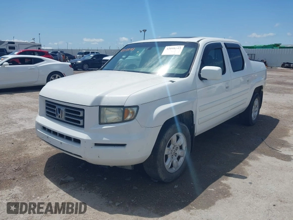 2007 Honda Ridgeline RTL z VIN 2HJYK16537H527957, wystawiony jako IAAI lot #42098143 z przebiegiem 233 163 mil mil oraz . Historia ofert i sprzedaży dostępna na DreamBid. Obrazek 2.