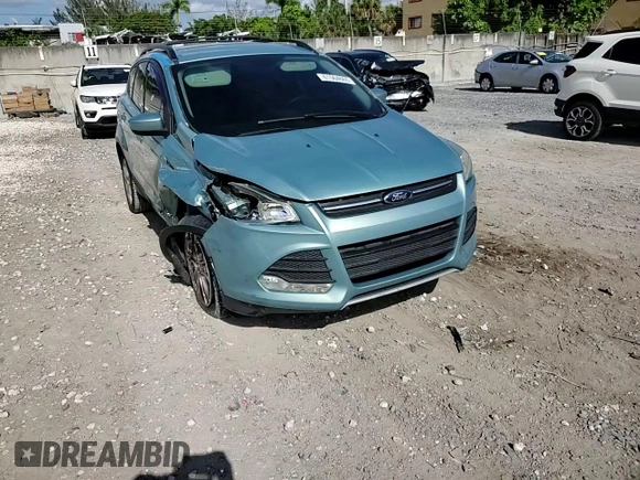 2013 Ford Escape SE z VIN 1FMCU0GX8DUA92814, wystawiony jako Copart lot #61564665 z przebiegiem 110 854 mil mil oraz Szkoda całkowita • Salvage title. Historia ofert i sprzedaży dostępna na DreamBid. Obrazek 13.