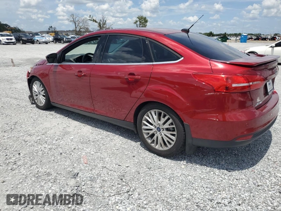 2016 Ford Focus Titanium with VIN 1FADP3J29GL274147, listed as a Copart auction lot 61377575 with 88,181 mi miles and Salvage title. Bid and sale history available at DreamBid. Image 2.