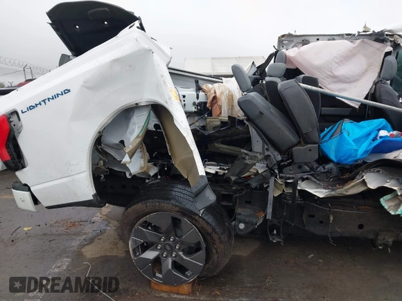 2023 Ford F-150 Lightning Pro with VIN 1FT6W1EV8PWG05765, listed as a IAAI auction lot 41461450 with Not Provided miles and . Bid and sale history available at DreamBid. Image 14.