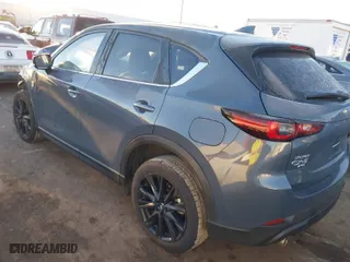 2023 Mazda CX-5 2.5 S Carbon Edition with VIN JM3KFBCM5P0242057, listed as a IAAI auction lot 41346204 with 1 mi miles. Bid and sale history available at carsss.com. Image 3.