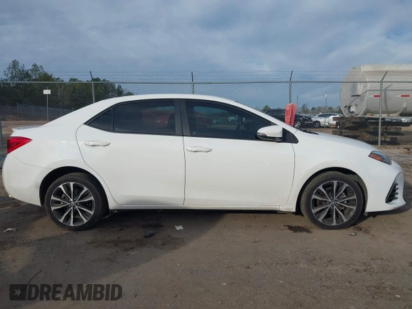 2017 Toyota Corolla L z VIN 5YFBURHE6HP632388, wystawiony jako IAAI lot #41299135 z przebiegiem 84 130 mil mil oraz . Historia ofert i sprzedaży dostępna na DreamBid. Obrazek 13.