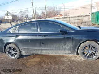 2018 Ford Fusion Hybrid SE with VIN 3FA6P0LUXJR131707, listed as a IAAI auction lot 41490634 with 129,500 mi miles. Bid and sale history available at carsss.com. Image 13.
