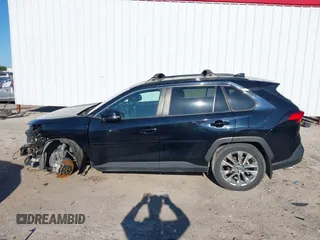 2021 Toyota RAV4 XLE Premium z VIN 2T3C1RFVXMW105387, wystawiony jako IAAI lot #42238526 z przebiegiem 58 627 mil mil oraz . Historia ofert i sprzedaży dostępna na DreamBid. Obrazek 14.