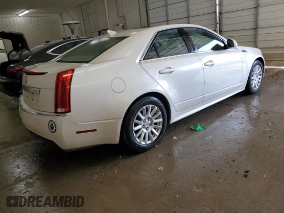 2012 Cadillac CTS Luxury with VIN 1G6DG5E57C0125969, listed as a Copart auction lot 49002865 with 105,800 mi miles and Salvage Title. Bid and sale history available at DreamBid. Image 3.