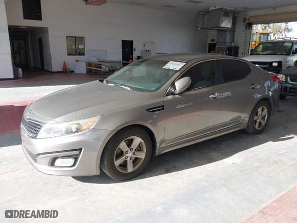 2015 Kia Optima LX with VIN 5XXGM4A77FG415572, listed as a IAAI auction lot 41611627 with 157,836 mi miles. Bid and sale history available at carsss.com. Image 2.
