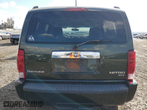 2010 Dodge Nitro SXT z VIN 1D4PT5GK2AW131913, wystawiony jako Copart lot #42711015 z przebiegiem 177 637 mil mil oraz Szkoda całkowita • Salvage title. Historia ofert i sprzedaży dostępna na DreamBid. Obrazek 6.