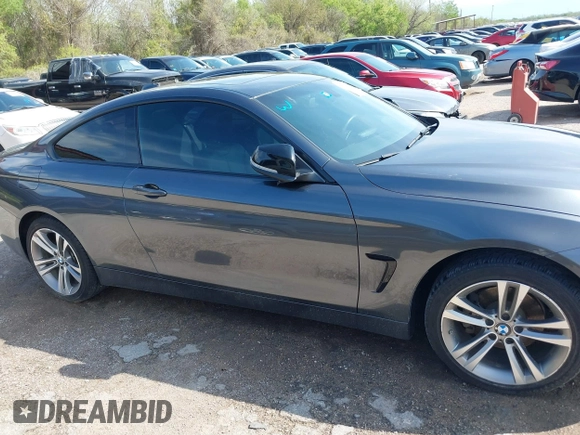 2015 BMW 4 Series 428i xDrive z VIN WBA3N5C55FK484938, wystawiony jako IAAI lot #41889907 z przebiegiem 100 439 mil mil oraz . Historia ofert i sprzedaży dostępna na DreamBid. Obrazek 13.