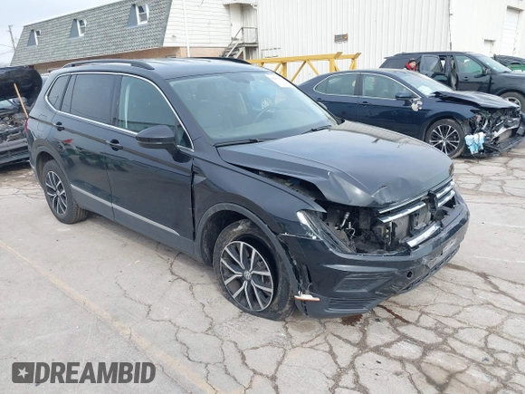 2021 Volkswagen Tiguan SE with VIN 3VV2B7AXXMM057849, listed as a IAAI auction lot 41879768 with 88,353 mi miles and . Bid and sale history available at DreamBid. Image 1.