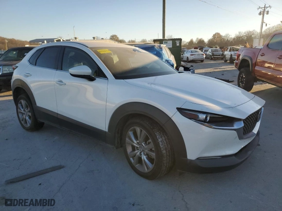 2020 Mazda CX-30 Select Package with VIN 3MVDMBCL1LM115794, listed as a Copart auction lot 83878064 with 82,185 mi miles and Salvage Title. Bid and sale history available at carsss.com. Image 4.