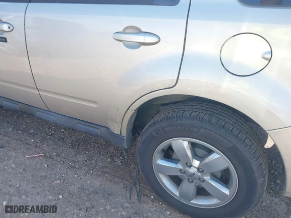 2012 Ford Escape Limited with VIN 1FMCU0EG4CKB75427, listed as a IAAI auction lot 42092721 with 169,269 mi miles. Bid and sale history available at carsss.com. Image 6.