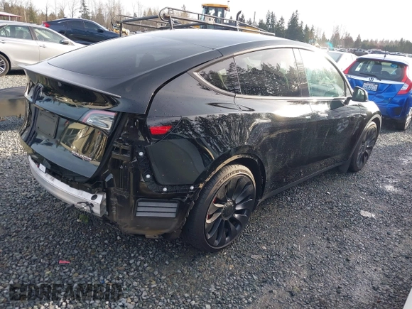 2022 Tesla Model Y Performance with VIN 7SAYGDEF0NF406262, listed as a IAAI auction lot 41132514 with 27,171 mi miles. Bid and sale history available at carsss.com. Image 4.