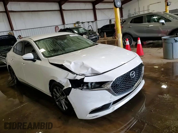 2019 Mazda 3 z VIN 3MZBPABL4KM114291, wystawiony jako Copart lot #57652945 z przebiegiem 148 644 mil mil oraz Szkoda całkowita • Salvage title. Historia ofert i sprzedaży dostępna na DreamBid. Obrazek 14.