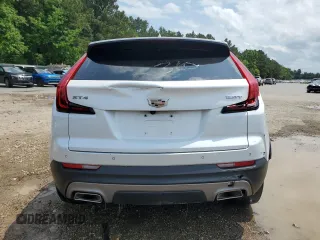2019 Cadillac XT4 FWD Premium Luxury z VIN 1GYFZCR41KF127888, wystawiony jako Copart lot #55027135 z przebiegiem 111 057 mil mil oraz Szkody całkowita. Historia ofert i sprzedaży dostępna na DreamBid. Obrazek 6.