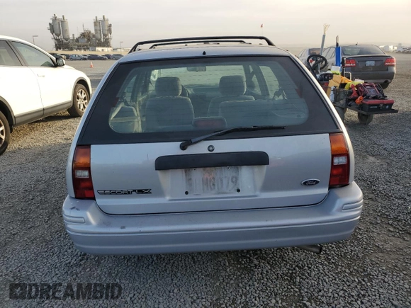 1994 Ford Escort z VIN 3FARP15J2RR121478, wystawiony jako Copart lot #42026955 z przebiegiem 541 834 mil mil oraz Czysty tytuł • Clean title. Historia ofert i sprzedaży dostępna na DreamBid. Obrazek 6.