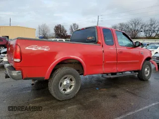 2001 Ford F-150 XL with VIN 1FTRX18L21NA50586, listed as a Copart auction lot 84245554 with 0 mi miles and Salvage Title. Bid and sale history available at carsss.com. Image 3.