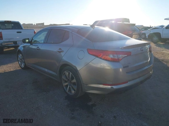 2013 Kia Optima SX w/Limited Pkg with VIN 5XXGR4A63DG124072, listed as a IAAI auction lot 40998791 with 144,696 mi miles. Bid and sale history available at carsss.com. Image 3.