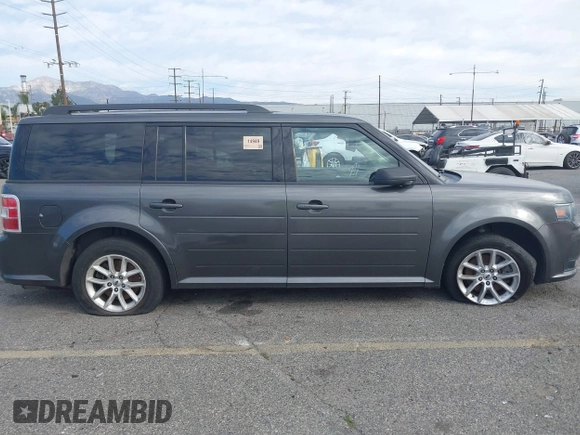 2016 Ford Flex SE with VIN 2FMGK5B87GBA01966, listed as a IAAI auction lot 41687761 with 95,728 mi miles. Bid and sale history available at carsss.com. Image 12.