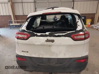 2016 Jeep Cherokee Latitude with VIN 1C4PJMCS1GW314036, listed as a IAAI auction lot 41303805 with 121,551 mi miles. Bid and sale history available at carsss.com. Image 16.