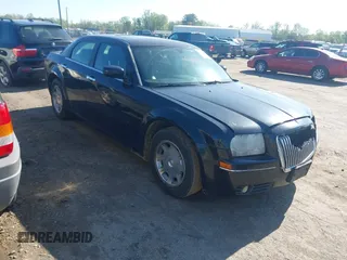 2005 Chrysler 300 with VIN 2C3JA53G55H122612, listed as a IAAI auction lot 41971677 with 1 mi miles. Bid and sale history available at carsss.com. Image 1.