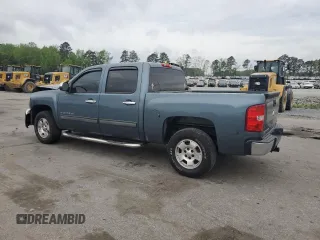 2013 Chevrolet Silverado 1500 LT with VIN 3GCPCSE02DG153586, listed as a Copart auction lot 51762165 with 149,659 mi miles and Salvage Title. Bid and sale history available at DreamBid. Image 2.