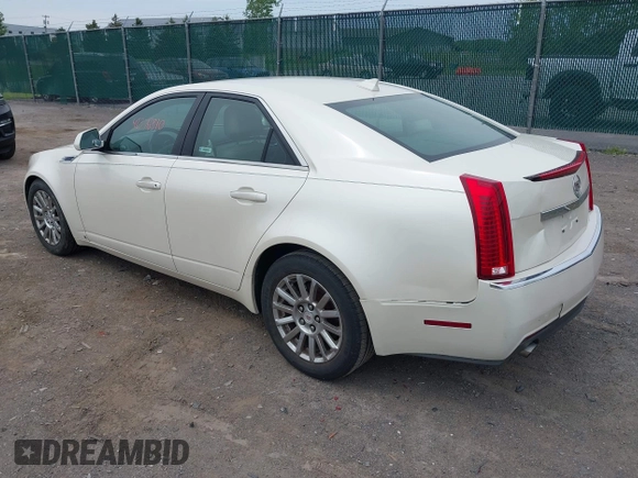 2009 Cadillac CTS RWD with VIN 1G6DF577290173180, listed as a IAAI auction lot 42376810 with 135,111 mi miles and . Bid and sale history available at DreamBid. Image 3.