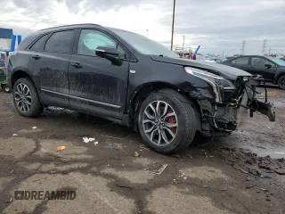2023 Cadillac XT5 AWD Sport with VIN 1GYKNHRS4PZ232257, listed as a Copart auction lot 45865565 with 26,522 mi miles and Non repairable. Bid and sale history available at DreamBid. Image 4.