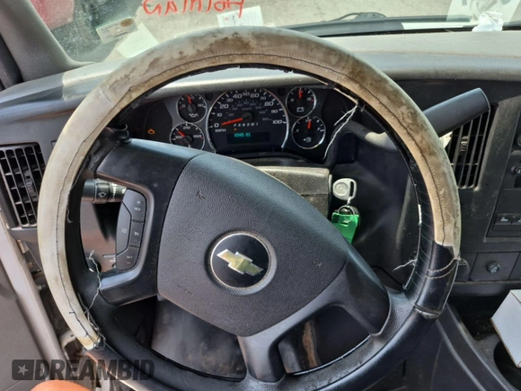2014 Chevrolet Express Cargo with VIN 1GCWGFCG4E1148722, listed as a IAAI auction lot 42785369 with 188,945 mi miles and . Bid and sale history available at DreamBid. Image 21.