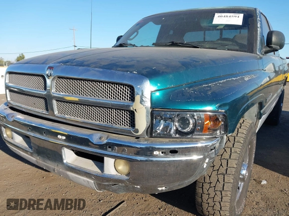 1999 Dodge Ram 2500 with VIN 3B7KC23Z5XG118959, listed as a IAAI auction lot 40484594 with 176,946 mi miles. Bid and sale history available at carsss.com. Image 6.