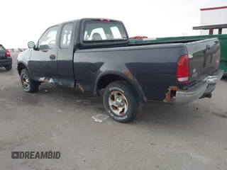 1999 Ford F-150 with VIN 1FTRX18W2XNA90069, listed as a IAAI auction lot 41496543 with 115,787 mi miles and . Bid and sale history available at DreamBid. Image 3.