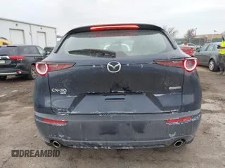 2022 Mazda CX-30 S with VIN 3MVDMBAL8NM411739, listed as a IAAI auction lot 41668265 with 34,964 mi miles and . Bid and sale history available at carsss.com. Image 15.
