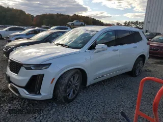 2020 Cadillac XT6 FWD Premium Luxury with VIN 1GYKPCRS2LZ138465, listed as a Copart auction lot 76114034 with 57,353 mi miles and Salvage Title. Bid and sale history available at carsss.com. Image 1.